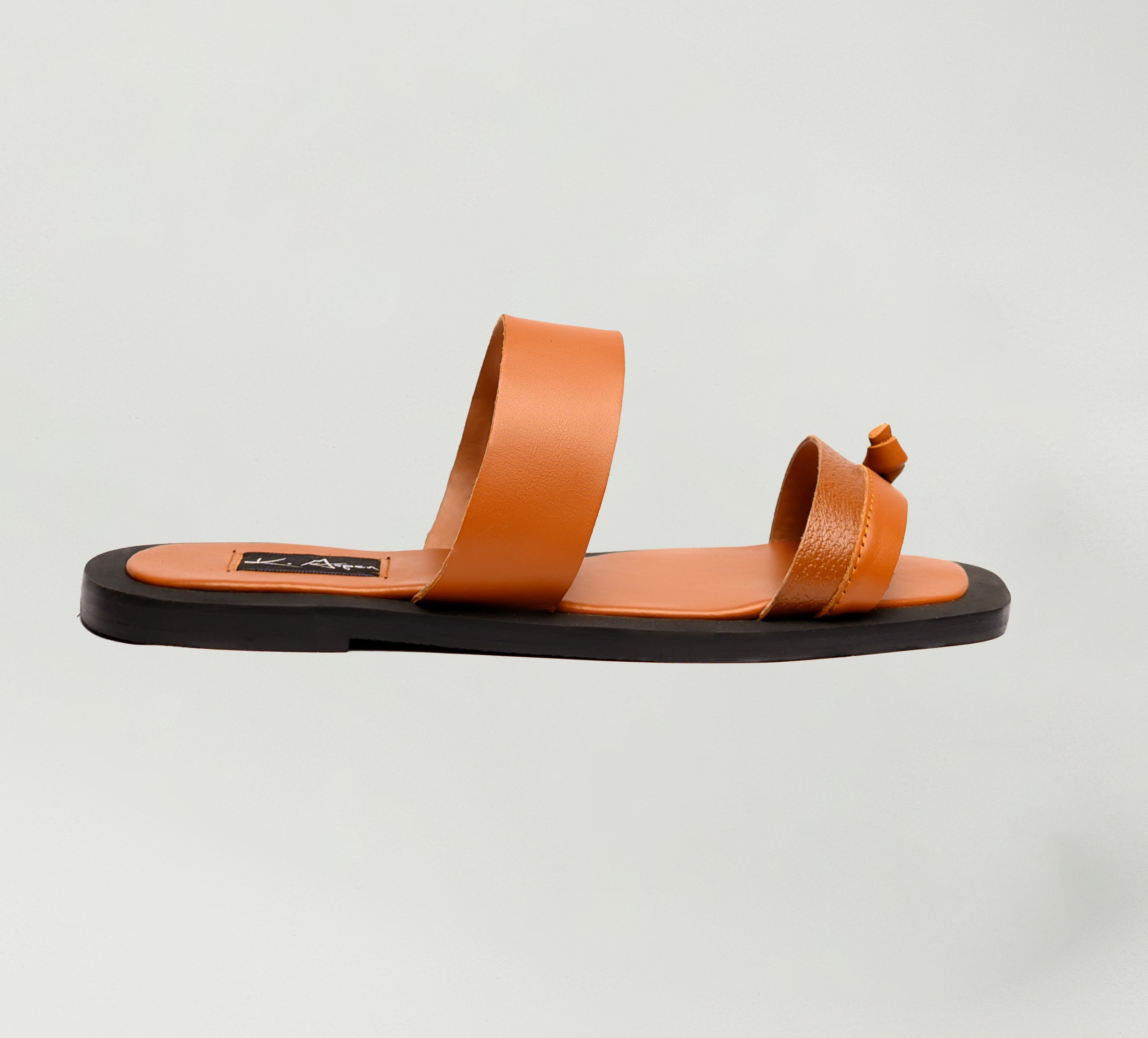 K.Aspen Bantu X Men's Leather Slippers - Premium Leather Finish, Ethically Crafted in Lagos, Nigeria. Hand-stitched with Soft Calf Textured Leather, Featuring a Traditionally Tied Knot. Contemporary Comfort and Style at its Best