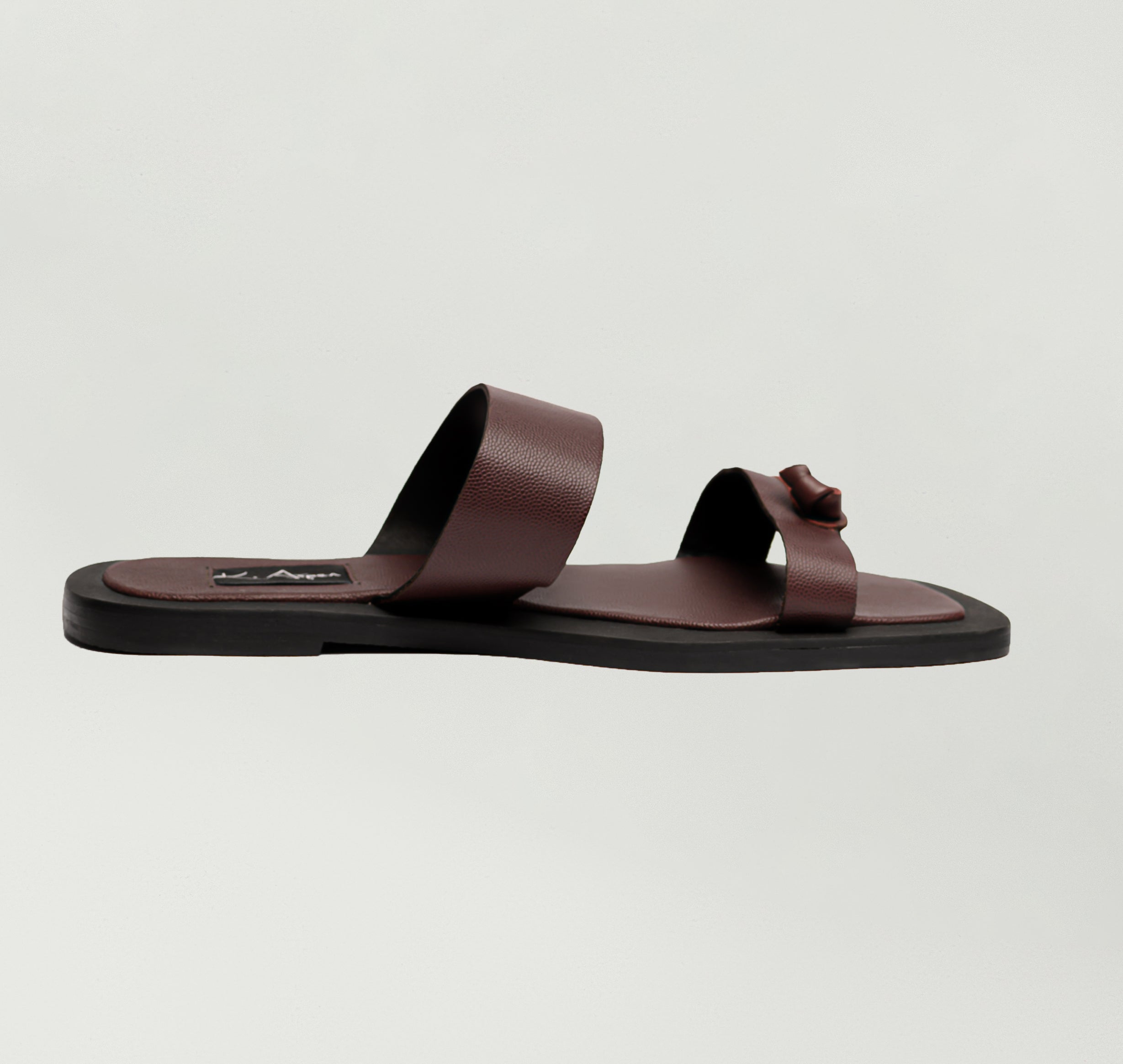 K.Aspen Bantu X Men's Leather Slippers - Premium Leather Finish, Ethically Crafted in Lagos, Nigeria. Hand-stitched with Soft Calf Textured Leather, Featuring a Traditionally Tied Knot. Contemporary Comfort and Style at its Best