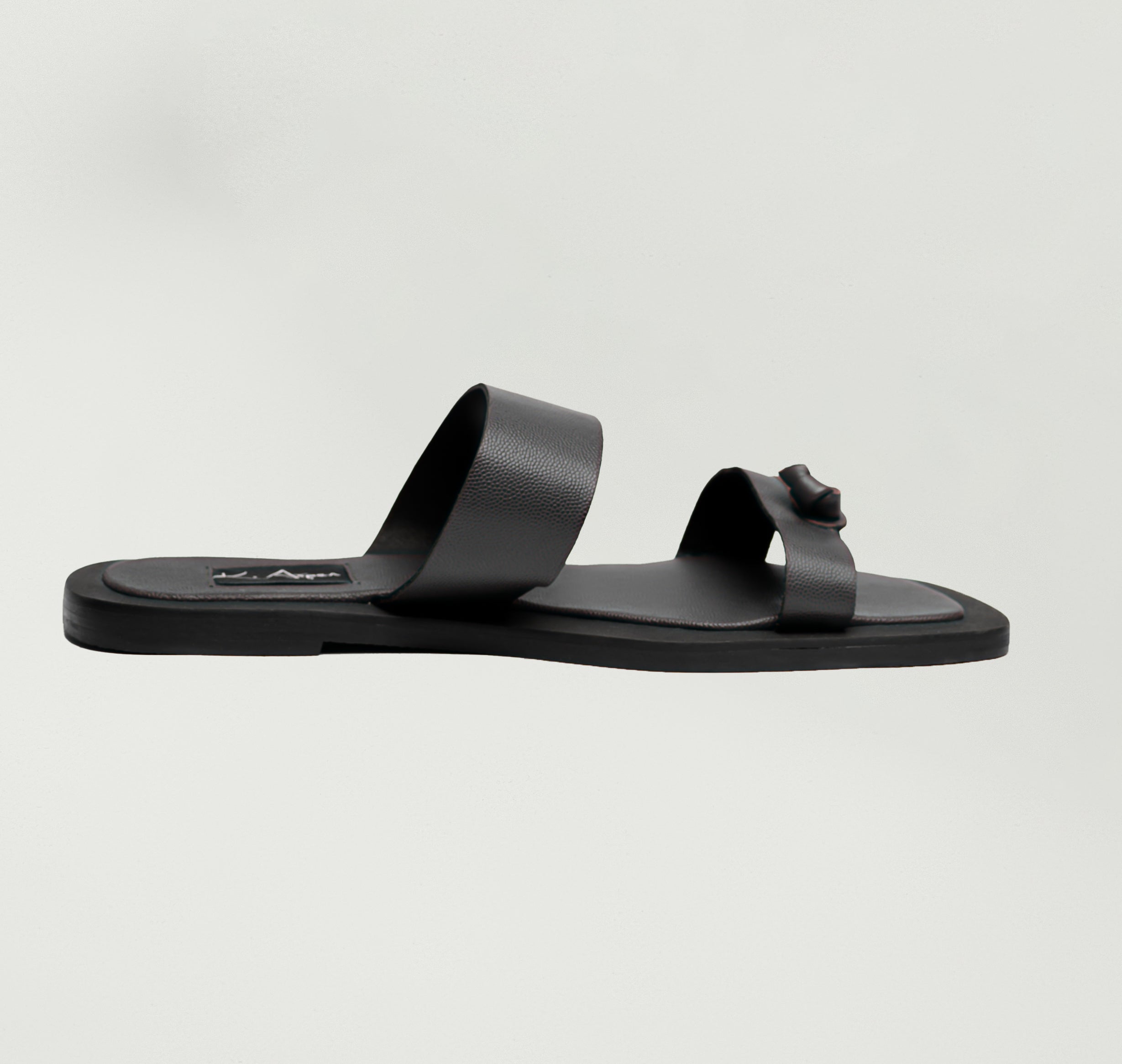 K.Aspen Bantu X Men's Leather Slippers - Premium Leather Finish, Ethically Crafted in Lagos, Nigeria. Hand-stitched with Soft Calf Textured Leather, Featuring a Traditionally Tied Knot. Contemporary Comfort and Style at its Best