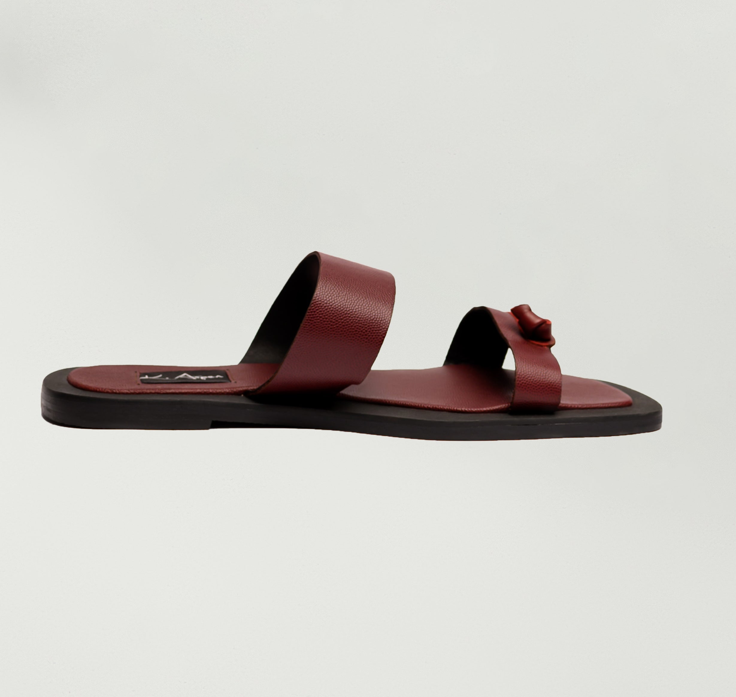 K.Aspen Bantu X Men's Leather Slippers - Premium Leather Finish, Ethically Crafted in Lagos, Nigeria. Hand-stitched with Soft Calf Textured Leather, Featuring a Traditionally Tied Knot. Contemporary Comfort and Style at its Best